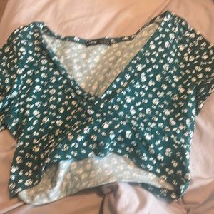 dark green v neck shirt